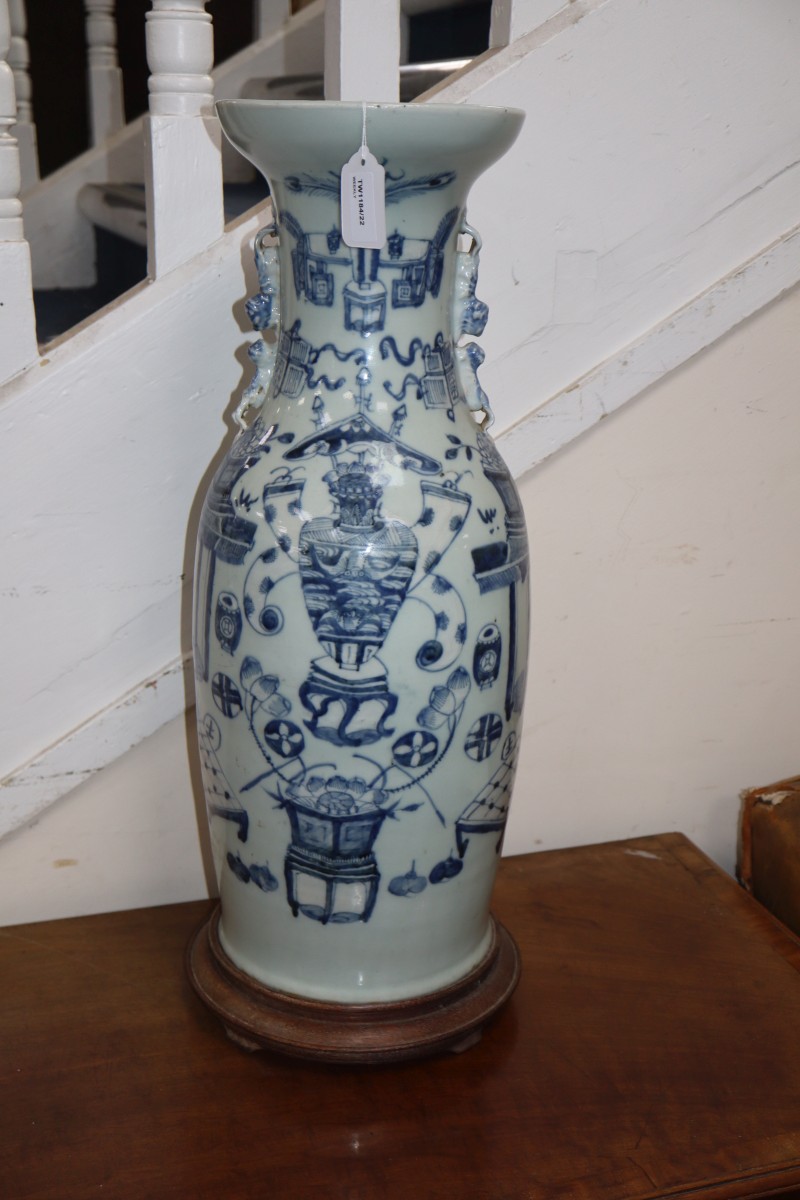 A Chinese blue and white vase and stand (drilled for electricity), glued to stand, overall height 63cm